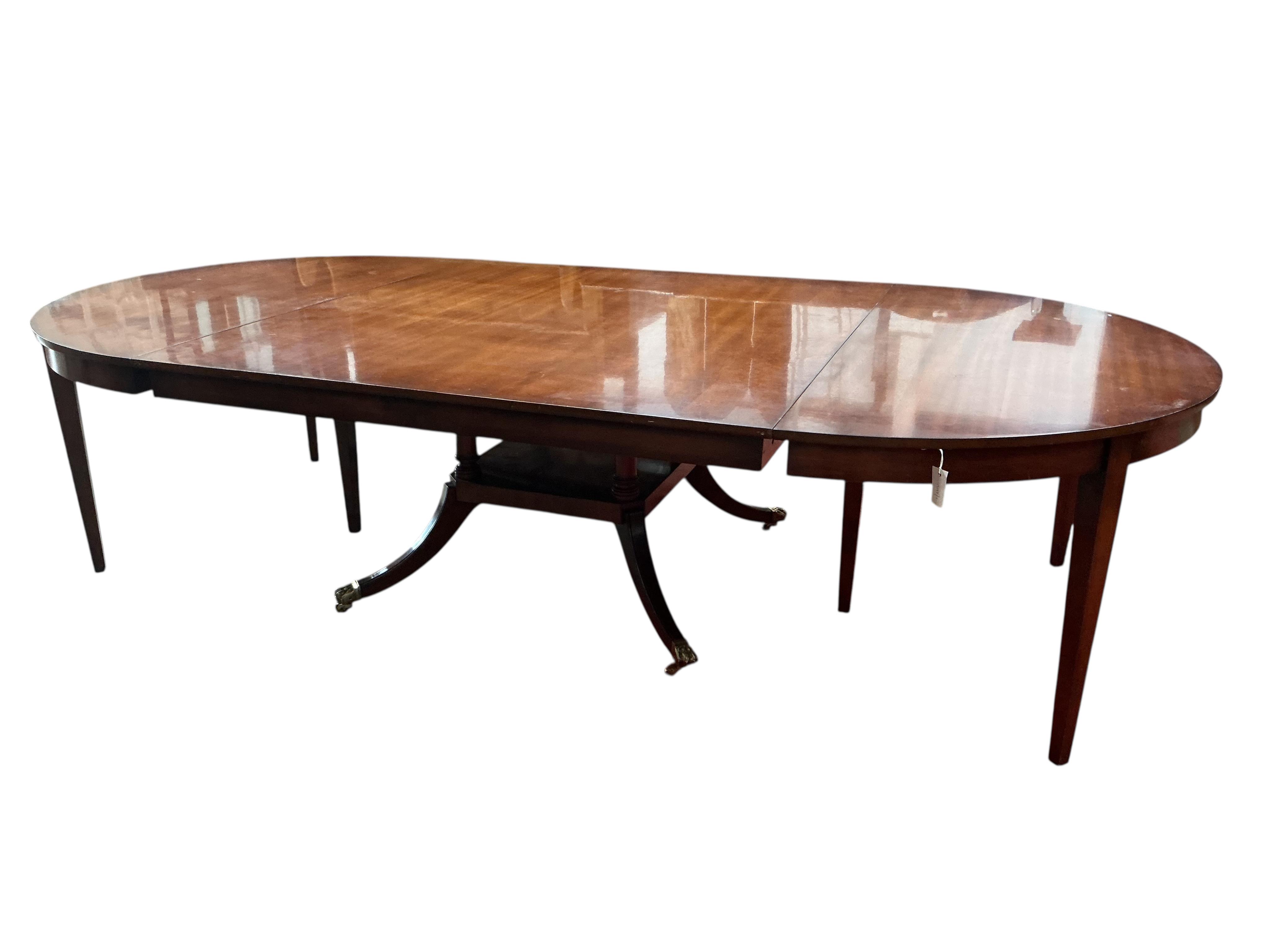 A reproduction George III style mahogany D end dining table, width 305cm extended, depth 145cm, height 74cm